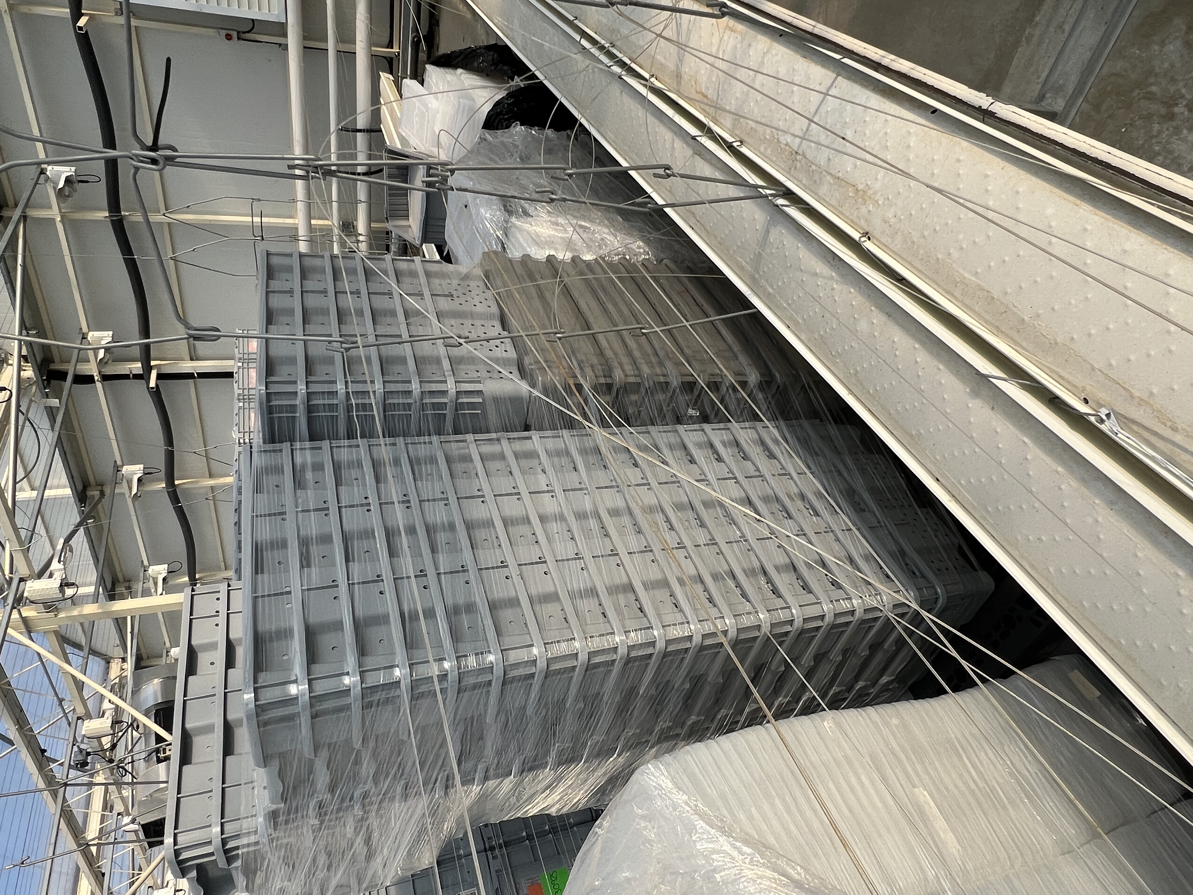 Grey crates with holes with lids